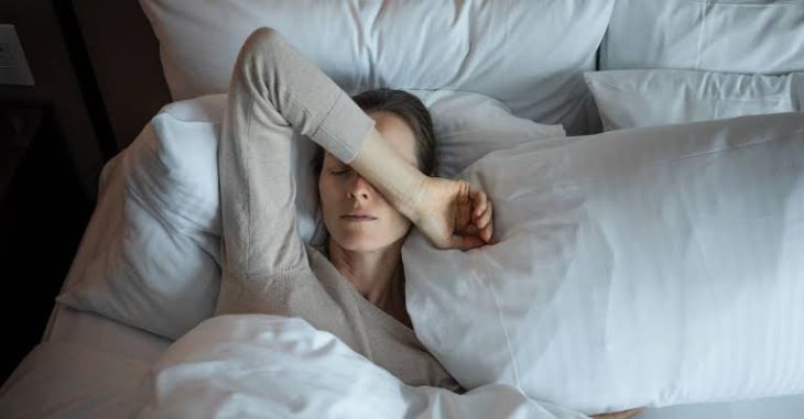 A biological diagram explaining menopause sleep disturbances and night sweat mechanisms