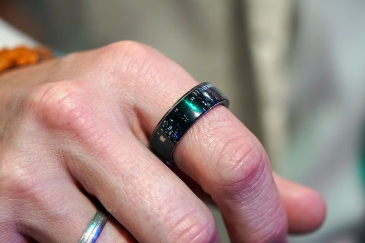 Person sleeping peacefully wearing a sleek biometric smart ring